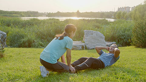 Happy mature Chinese couple exercising in park,4K