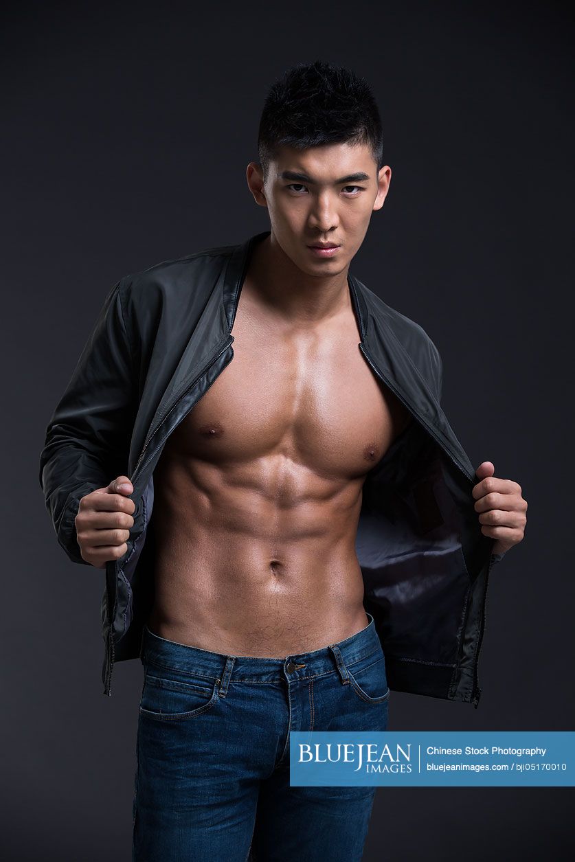 Portrait of young Chinese muscular man