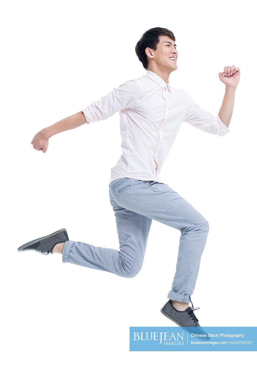 Young Chinese man jumping