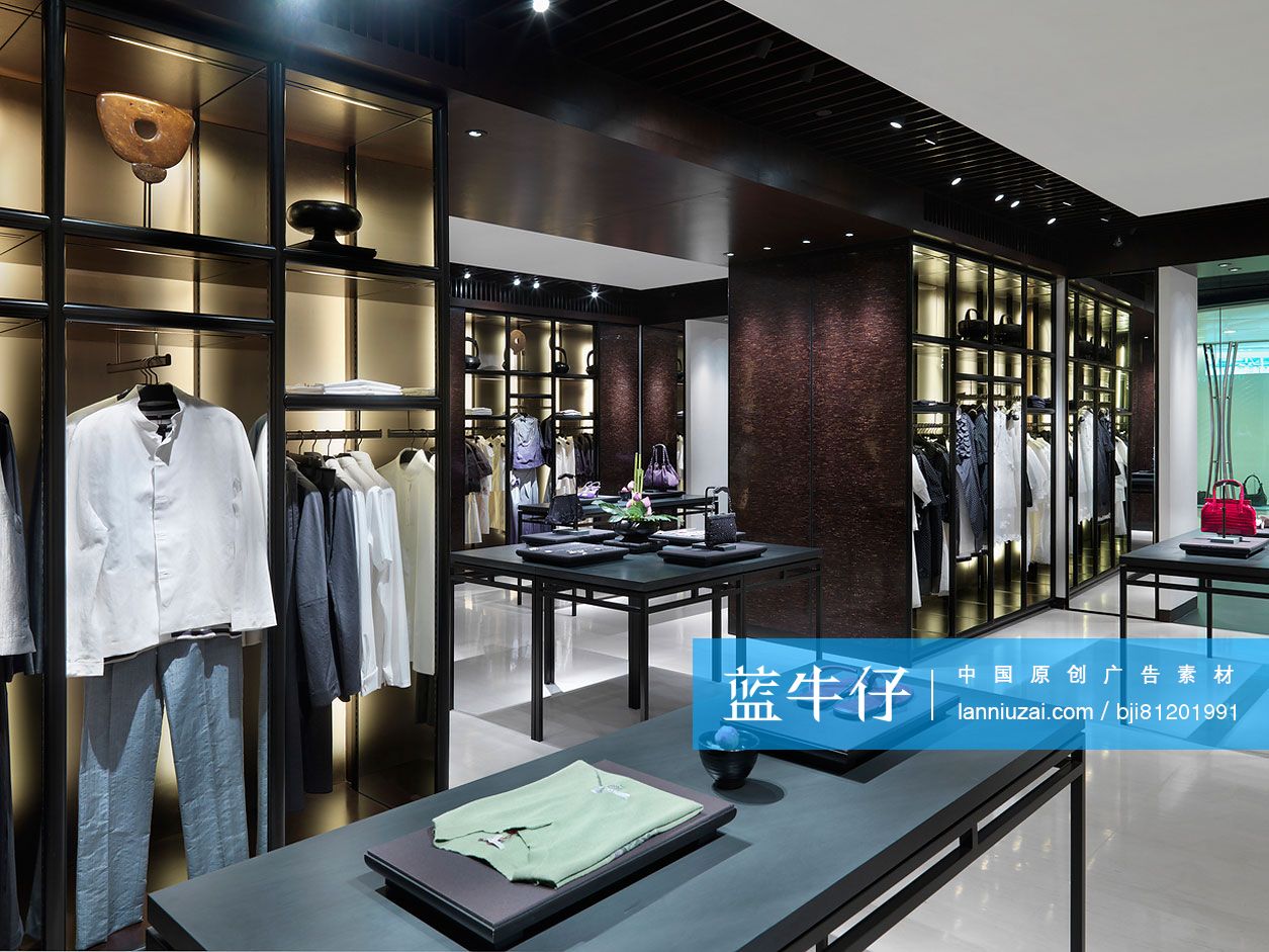 Interior of fashion boutique with purse; shoes and clothes on display-蓝 ...