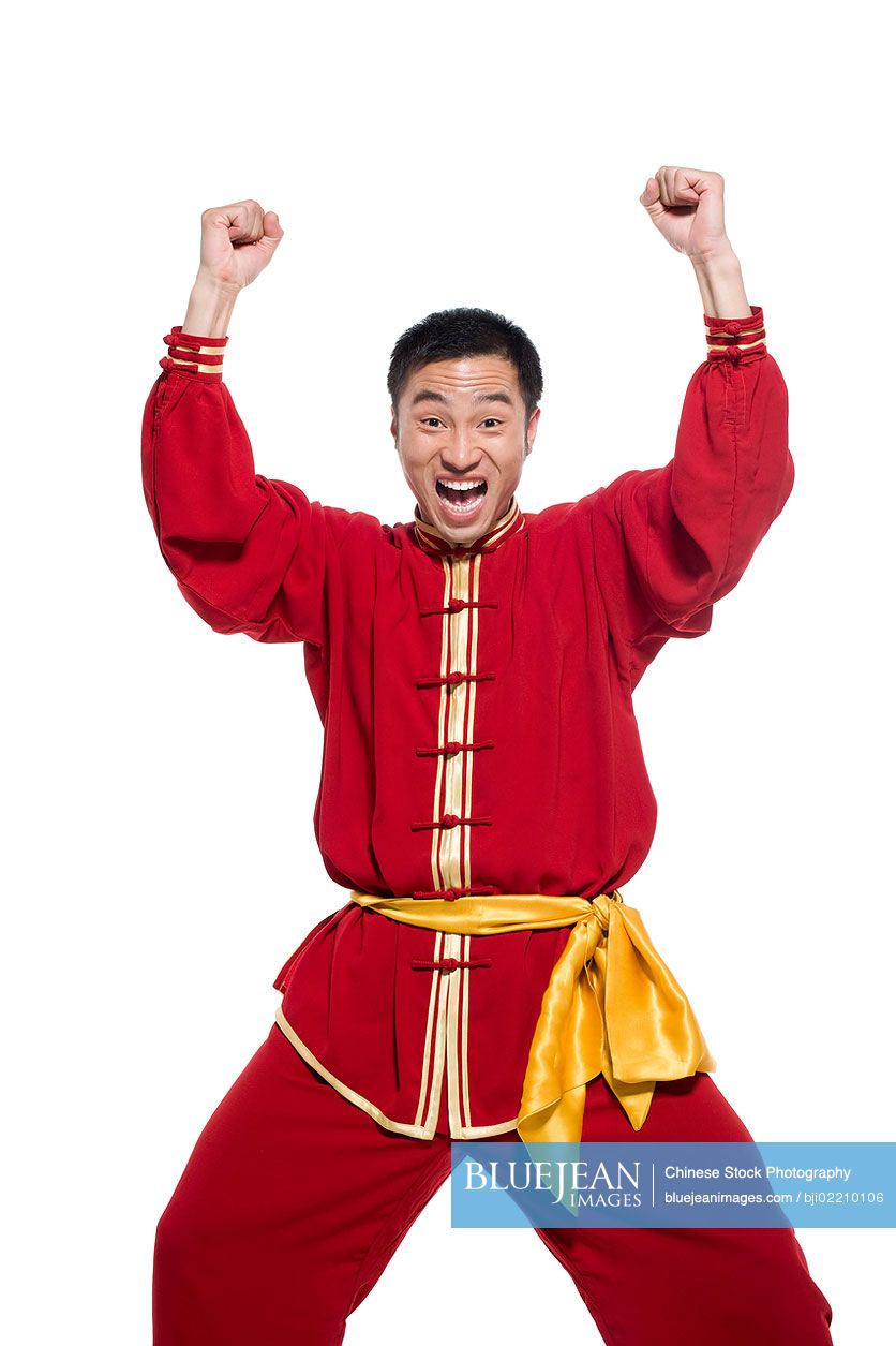 Excited Chinese man in traditional clothing