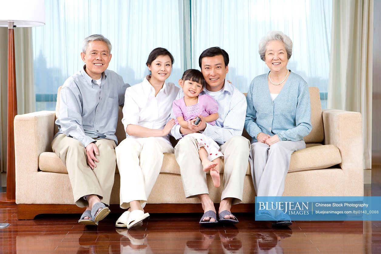 Chinese three generations on couch