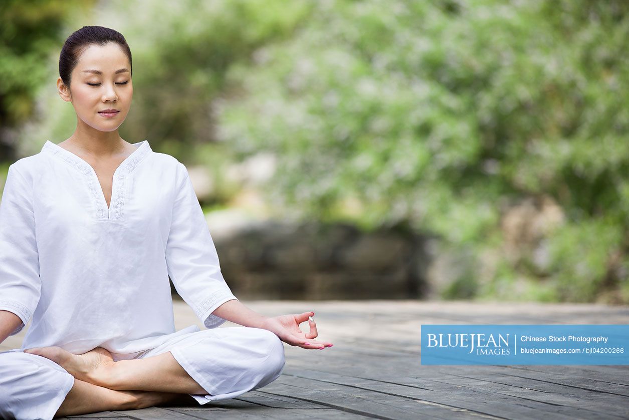 Young Chinese woman in meditation