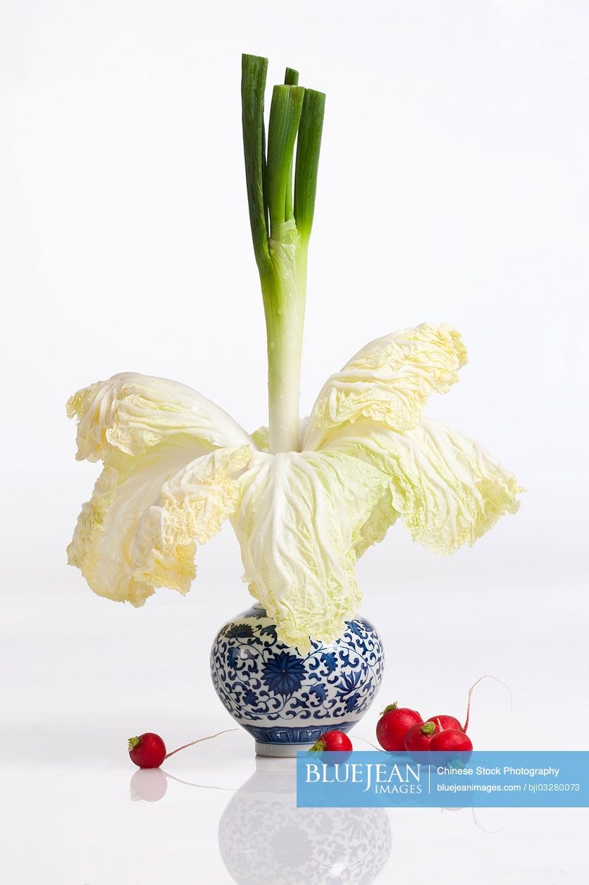 Blue and white porcelain with fresh vegetables