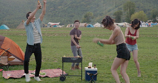 Happy young Chinese friends having fun outdoors,4K