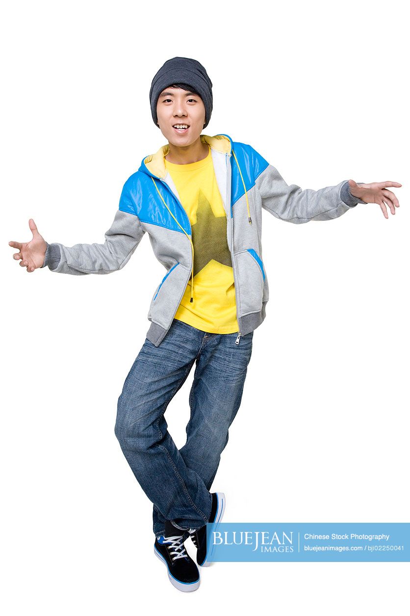 Hip Chinese man posing with his arms out