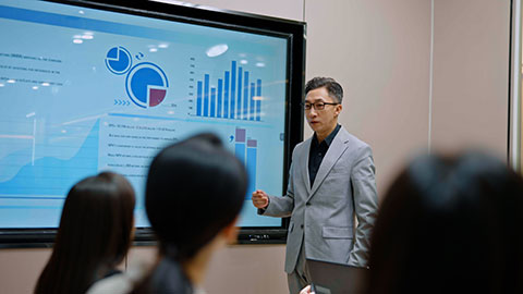 Confident Chinese business people having a meeting