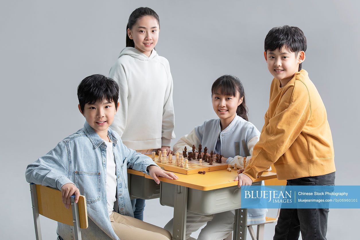 friends playing chess, Stock image