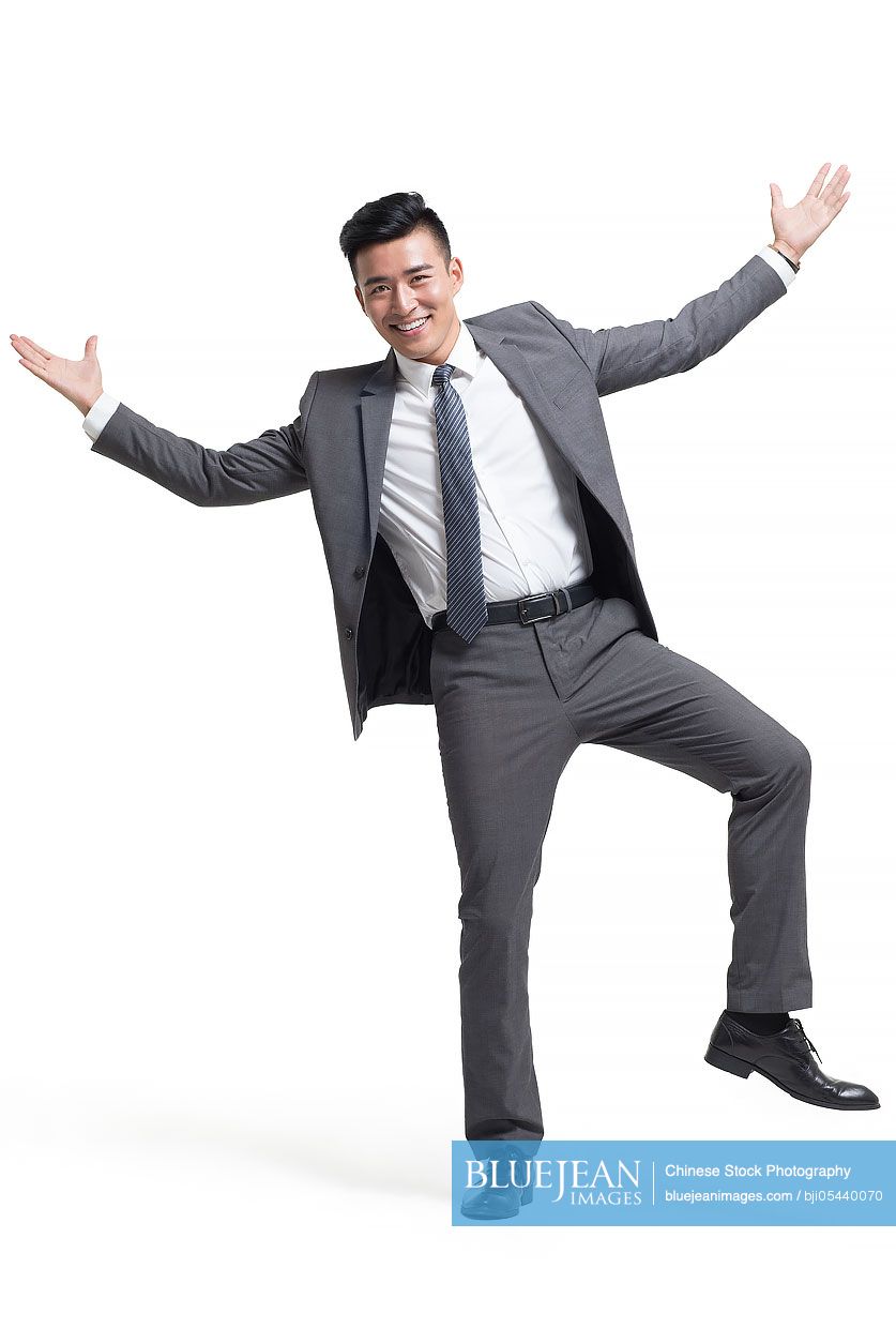 Cheerful young Chinese businessman