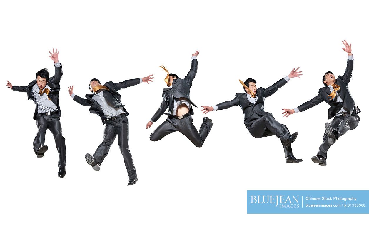 Five Chinese businessmen flipping in the air