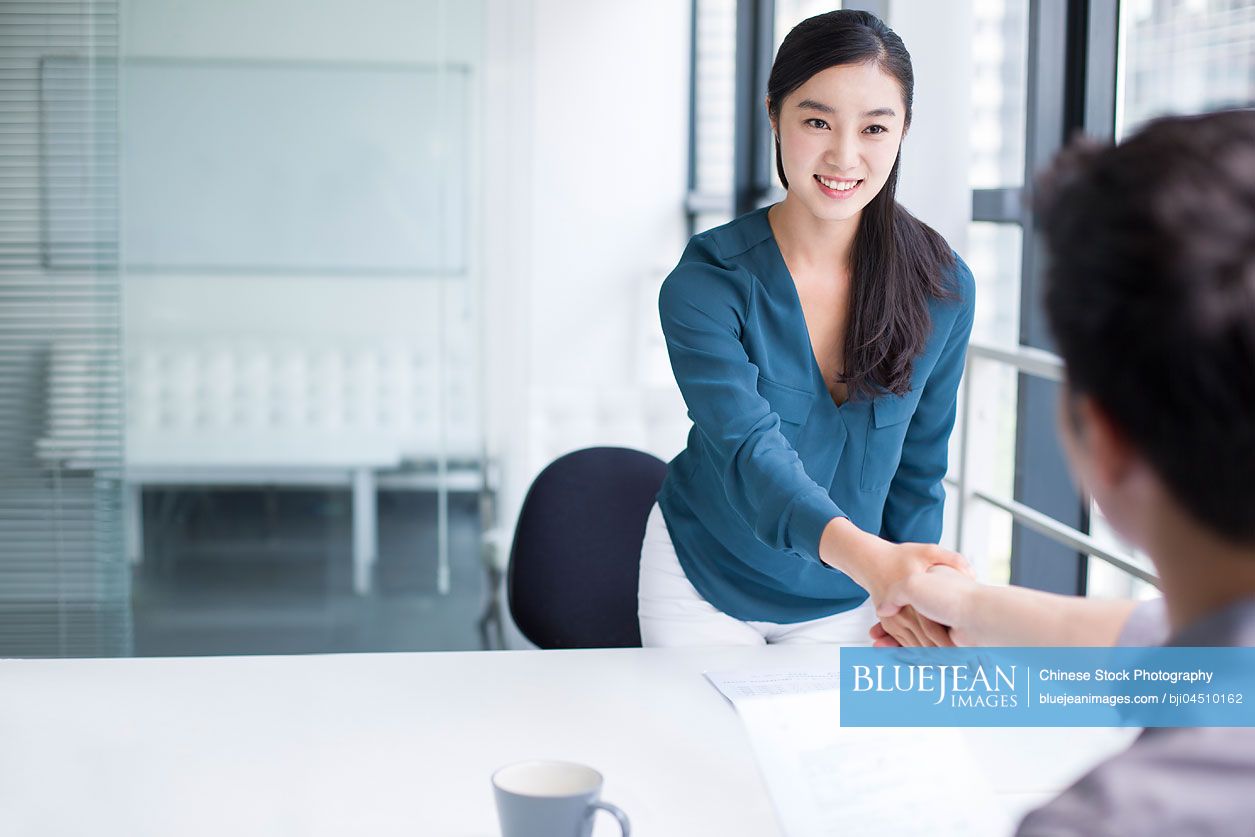 Young Chinese woman interviewing for a job