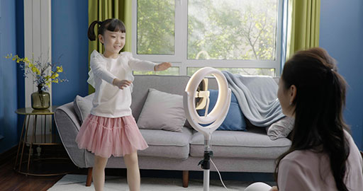 Little girl dancing on a live stream