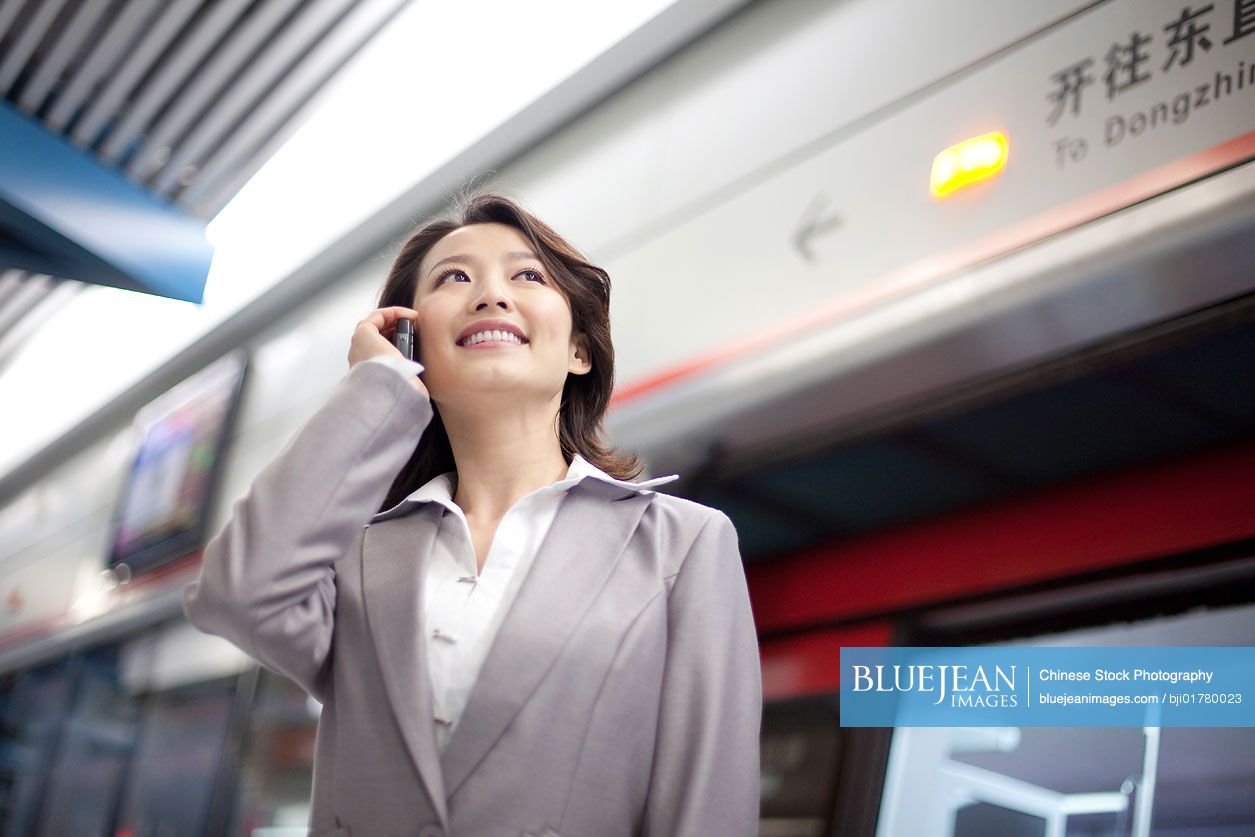 Chinese commuter on the phone