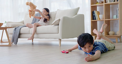 Chinese sibling playing with toys in living room,4K