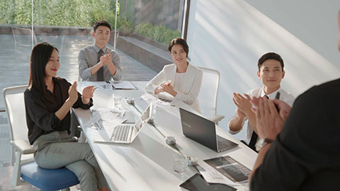 Chinese business people having meeting in board room,4K