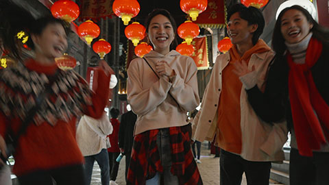 Happy young Chinese friends celebrating Chinese new year,4K
