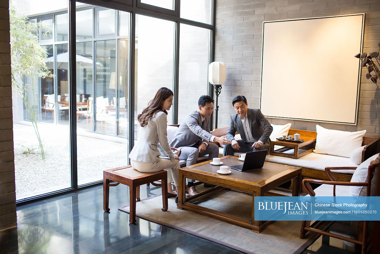 Chinese business people having a meeting