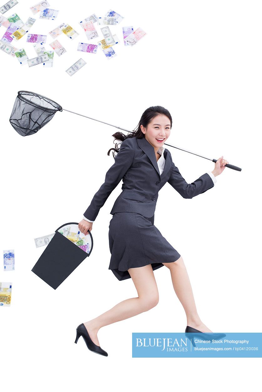 Chinese businesswoman catching money with butterfly net-High-res stock ...