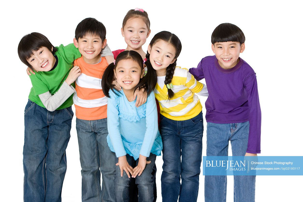 A group of Chinese friends smiling to the camera