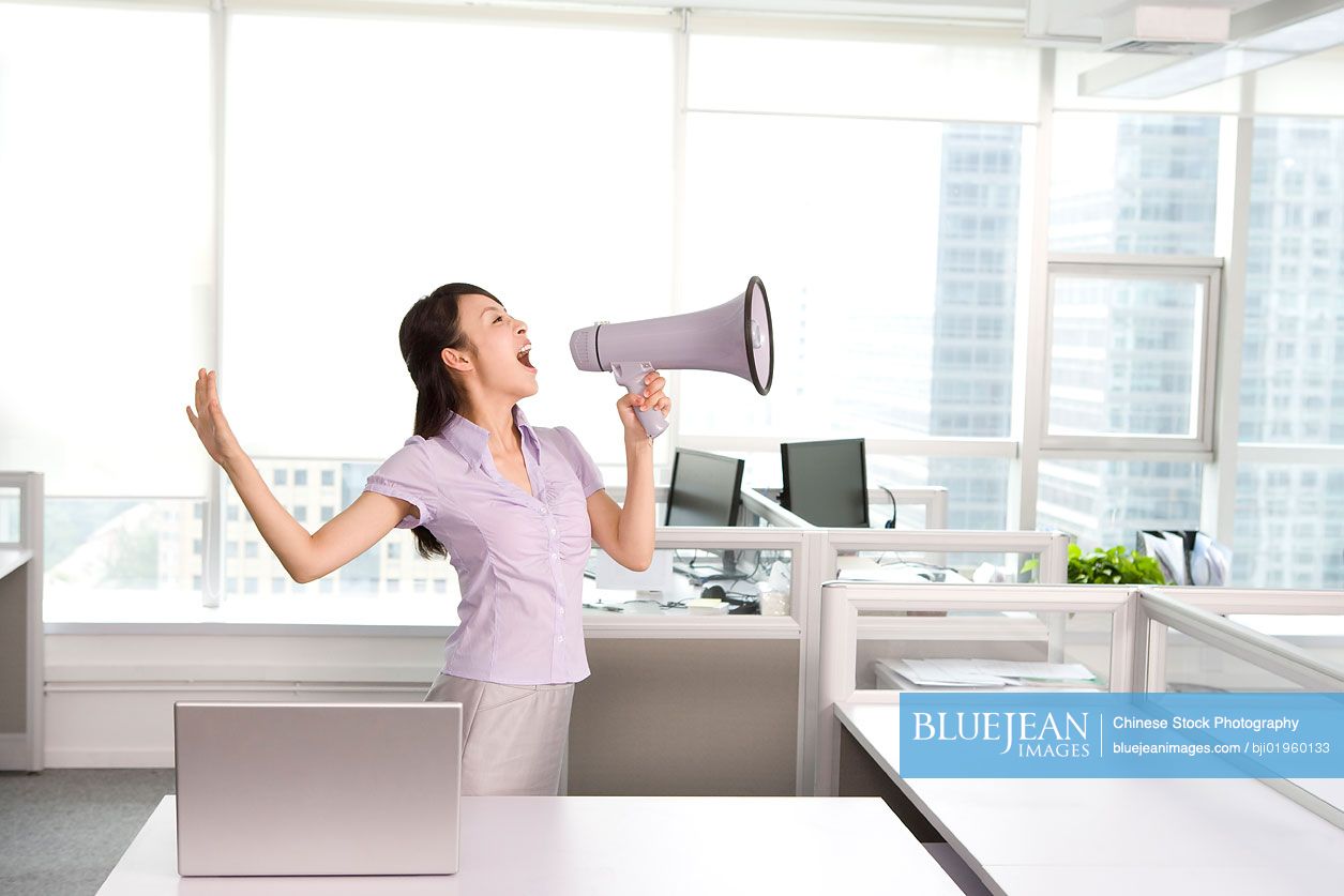 Chinese office worker getting loud in the office