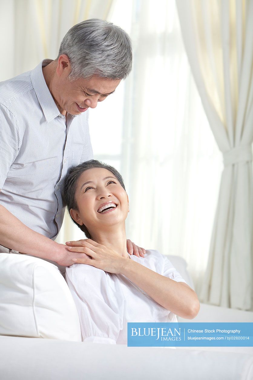 Tender moment between Senior Chinese couple