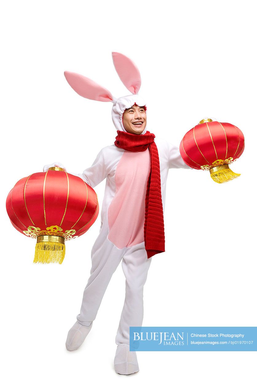 Mid-adult Chinese man celebrating the Year of the Rabbit