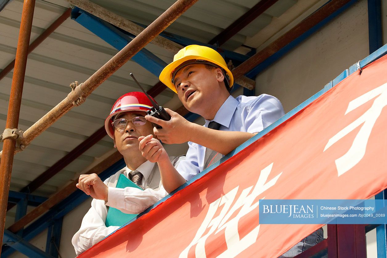 Chinese Construction Contractors Looking Into The Distance