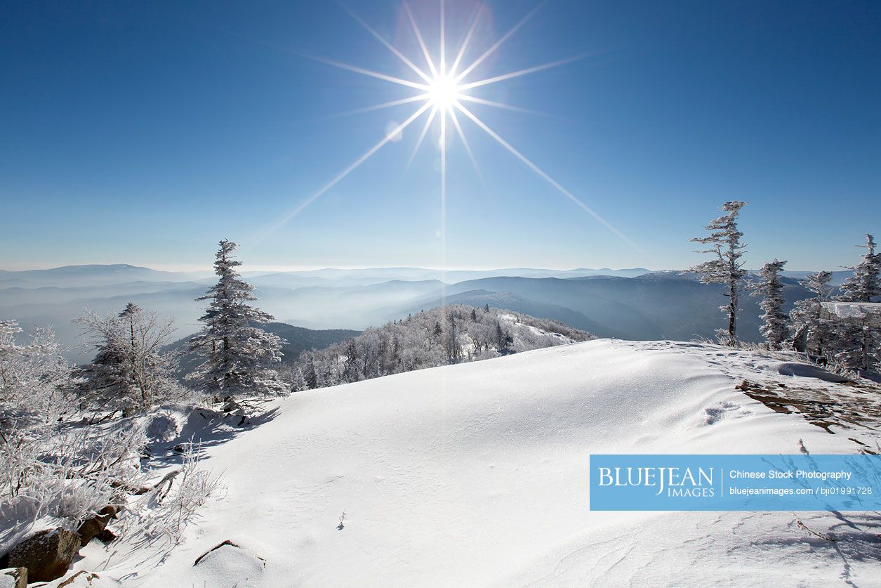 Sun shining on snow, China