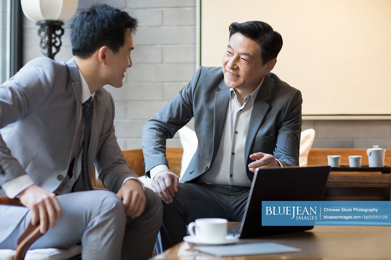 Chinese businessmen having a meeting