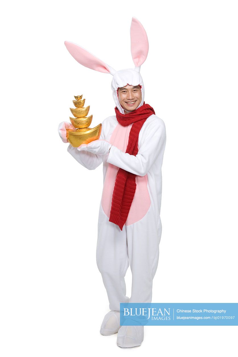 Mid-adult Chinese man celebrating the Year of the Rabbit