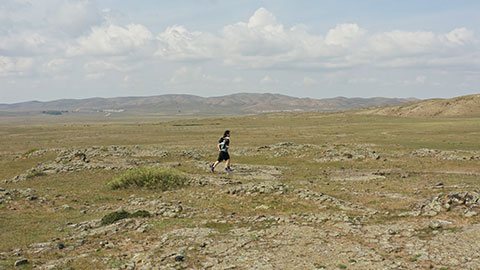 Happy Chinese couple trail running in nature,4K