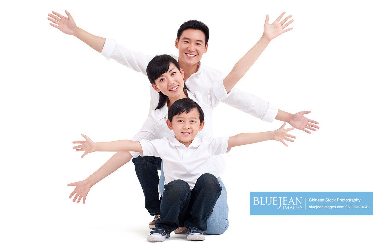 Portrait of a happy Chinese family with one child