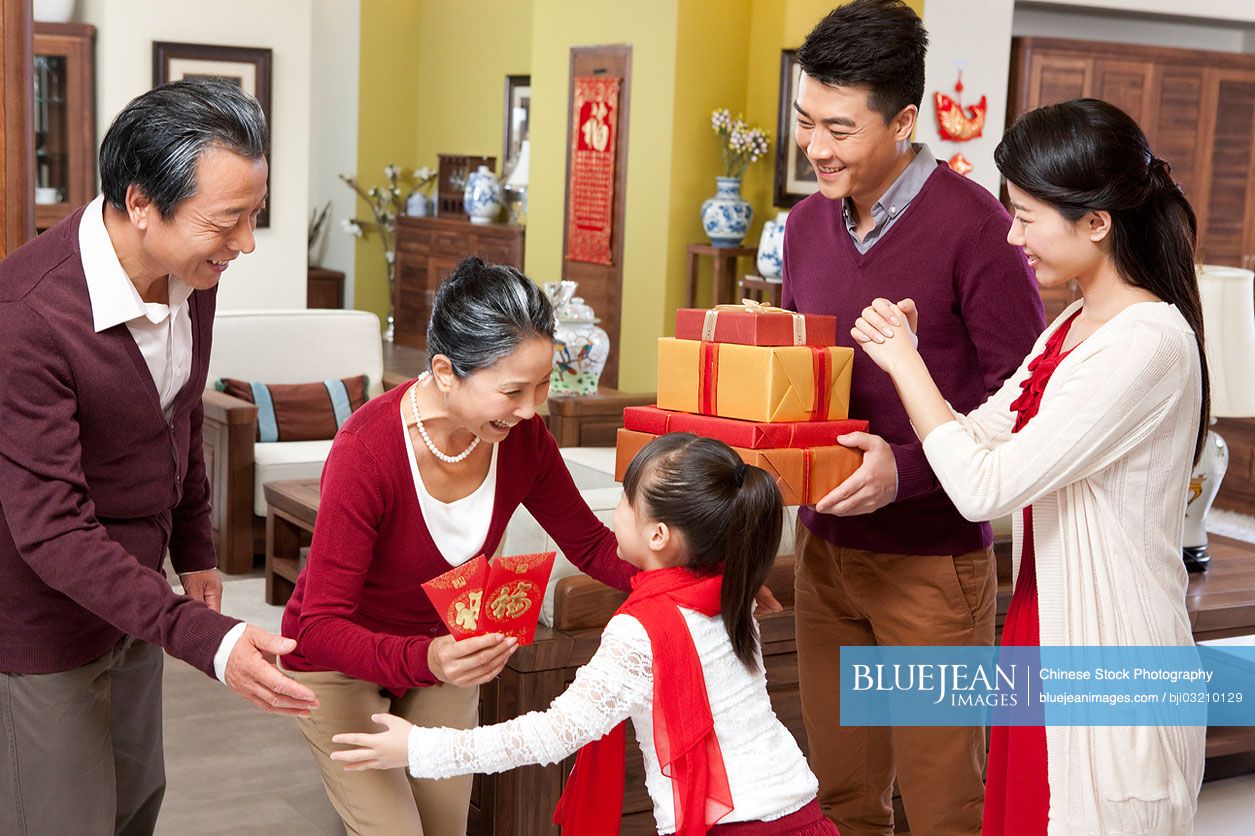 Family visiting with gifts during Chinese New Year