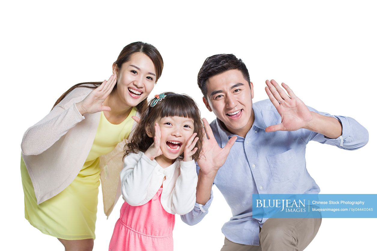 happy-young-chinese-family-shouting-together-high-res-stock-photo-for