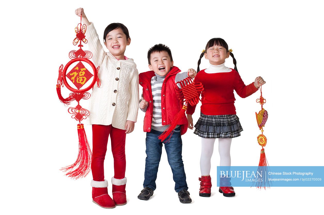 Chinese children holding traditional Chinese items-High-res stock photo ...