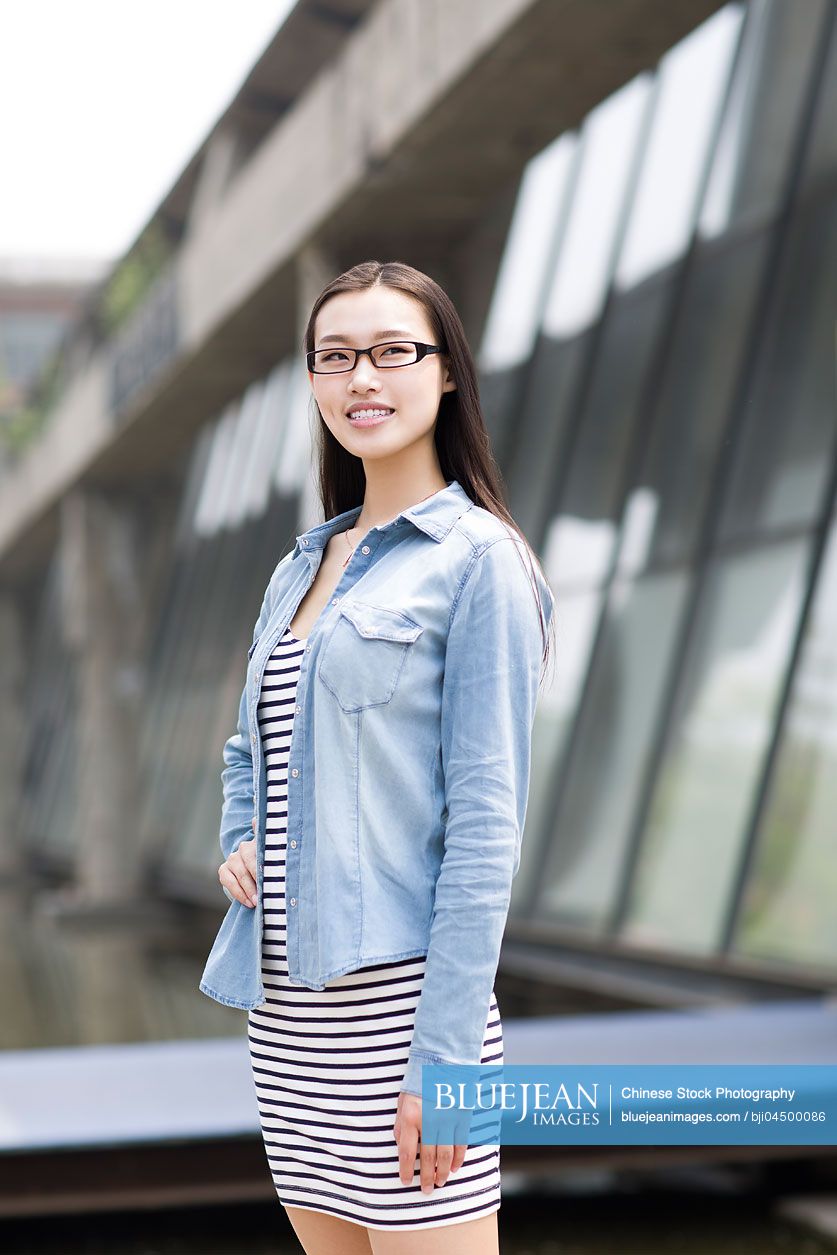 Young Chinese woman thinking