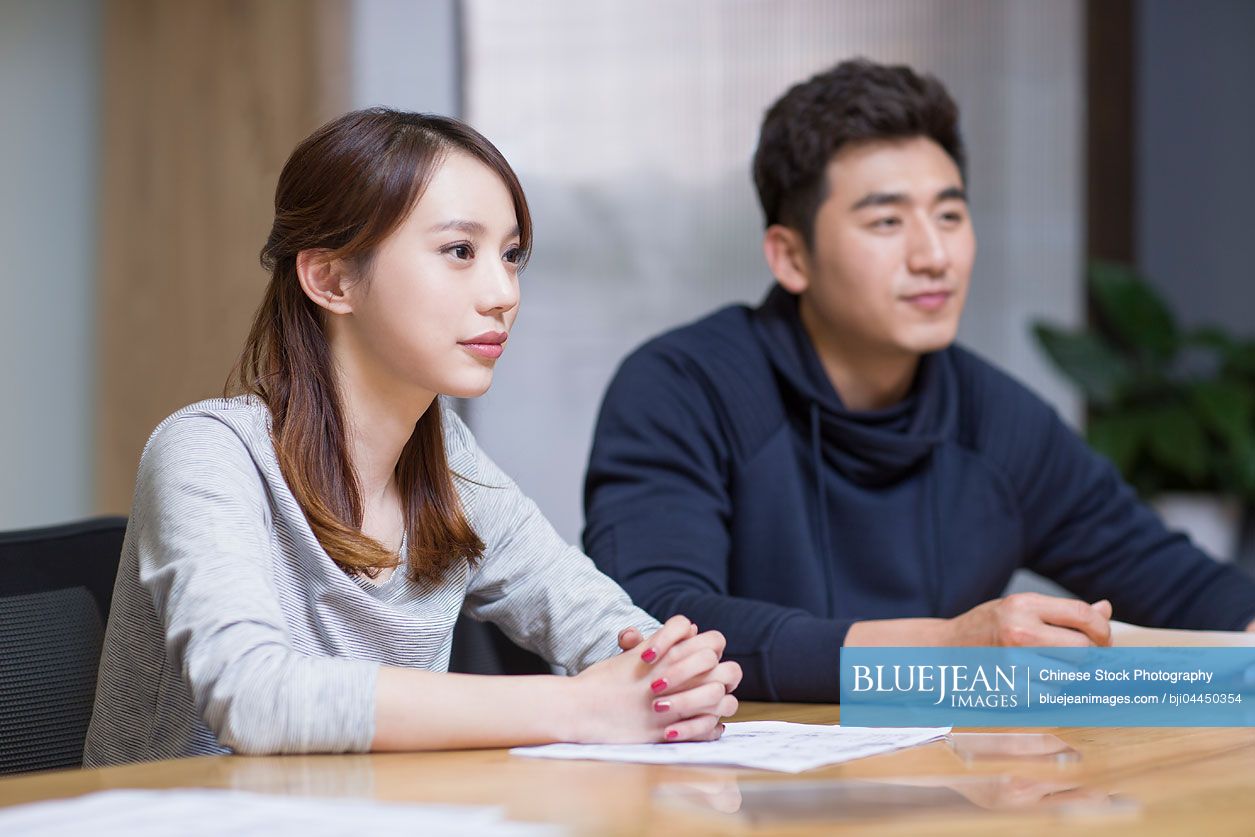 Chinese business people having a meeting in board room