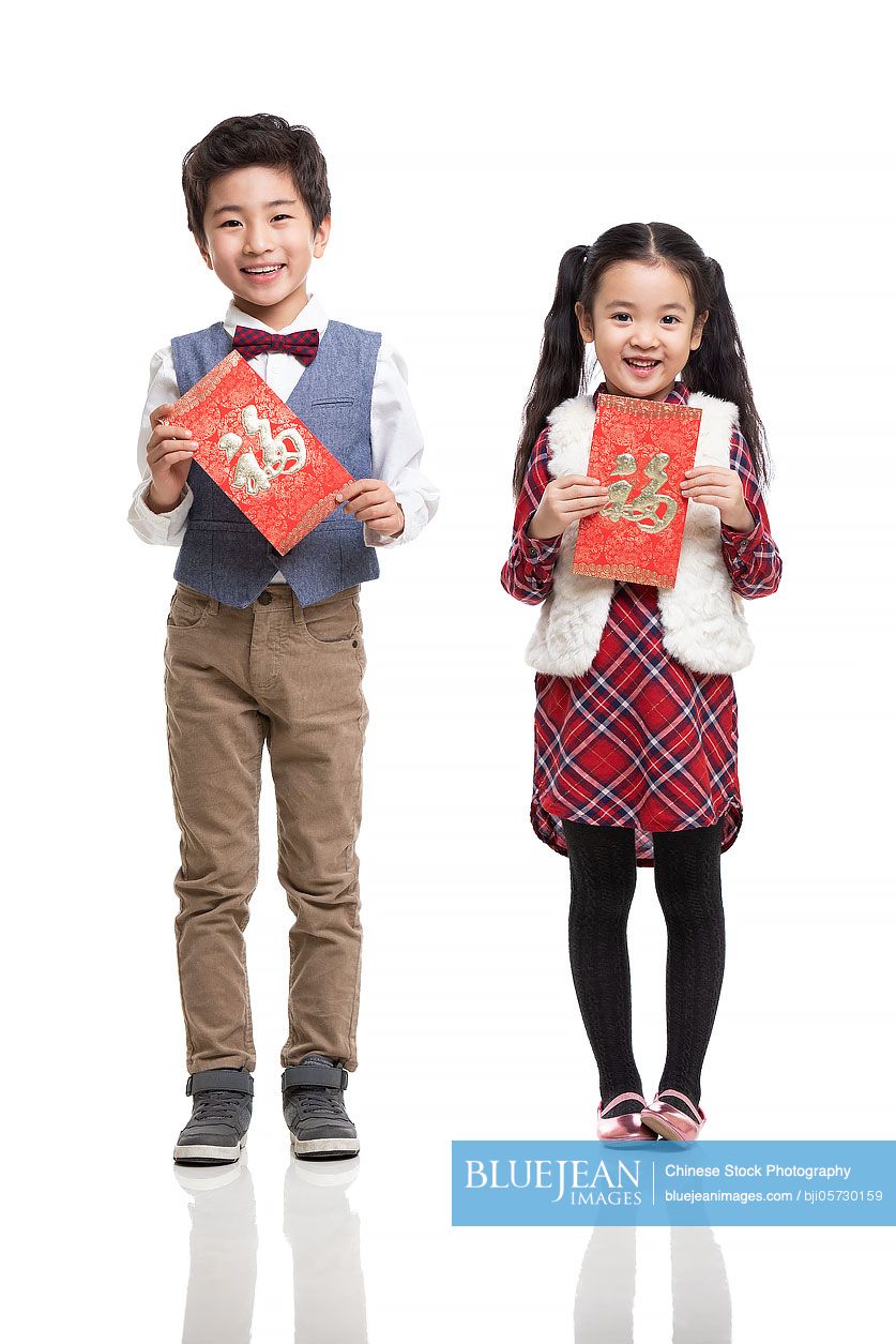 Happy Chinese sibling celebrating Chinese New Year