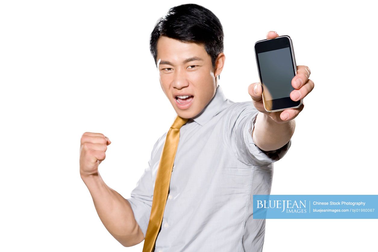 Chinese businessman holding iPhone