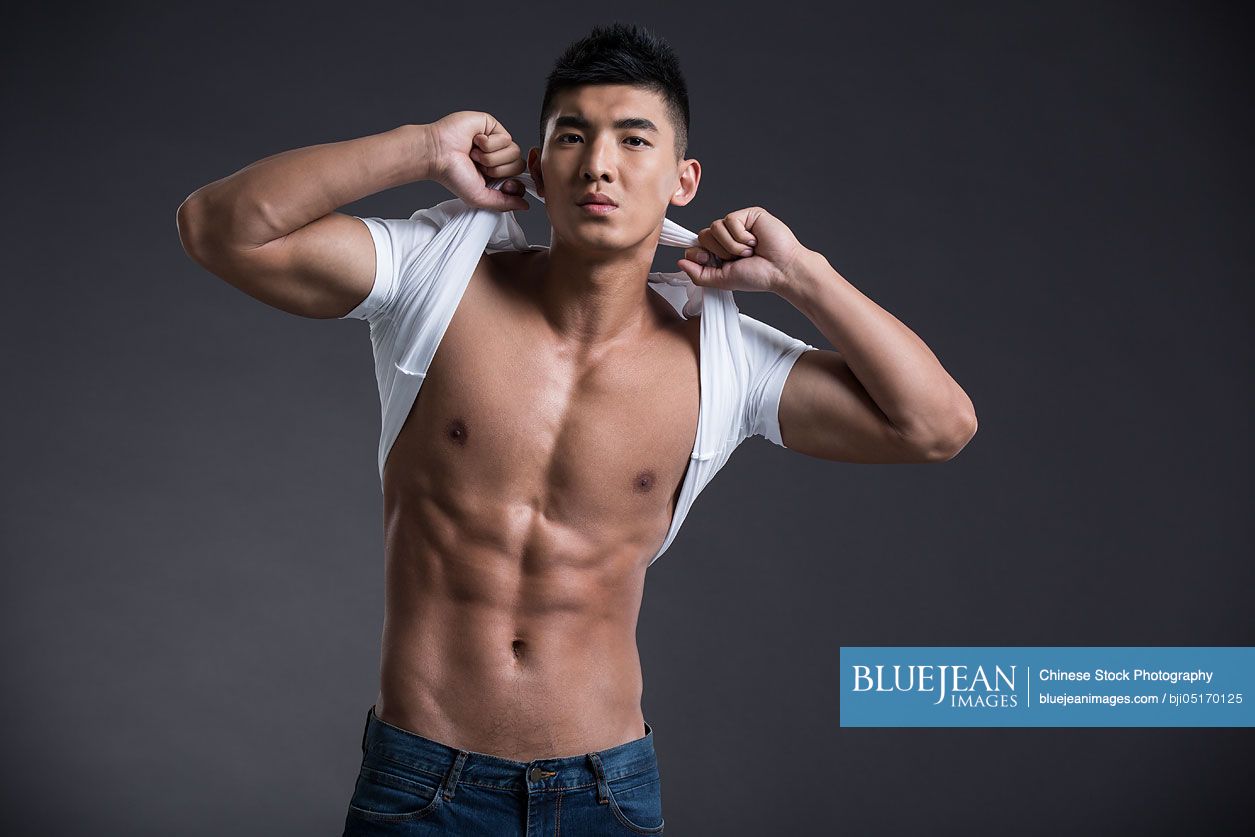 Portrait of young Chinese muscular man