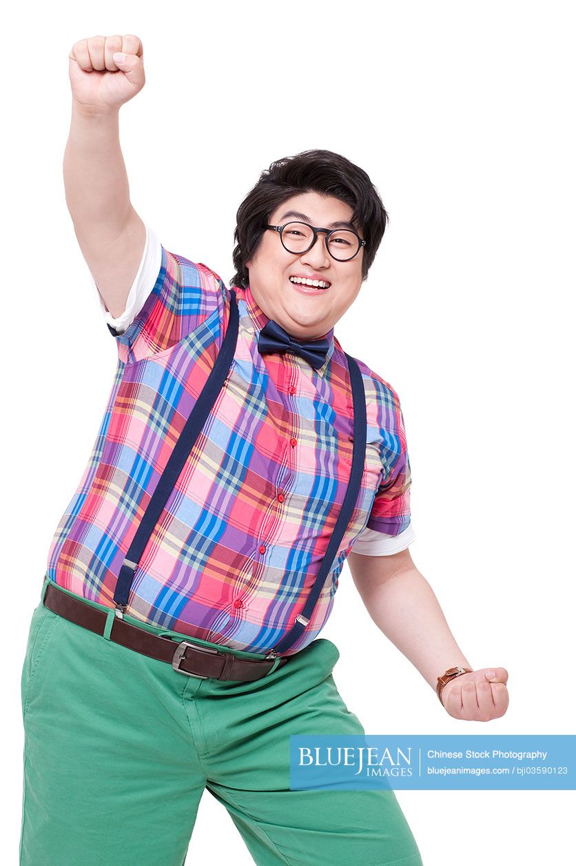 Excited Chubby Chinese man punching the air
