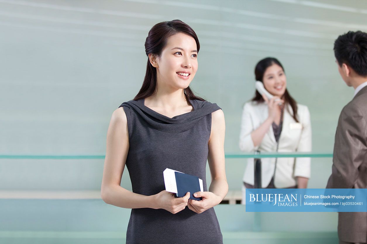 Chinese businesswoman at reception desk