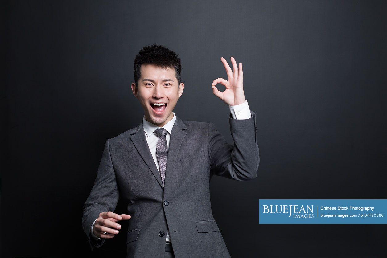 Excited Chinese businessman