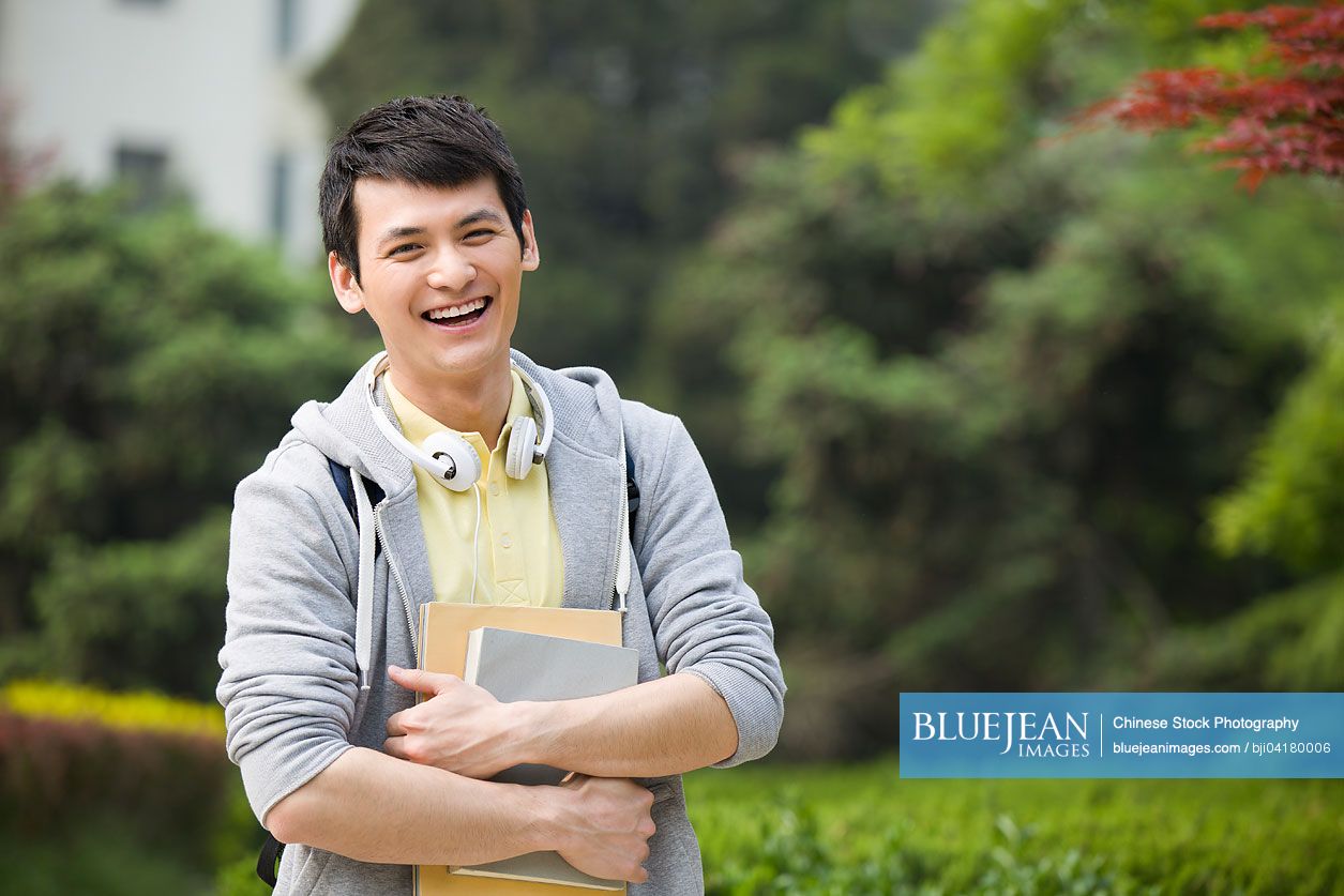 Male Chinese college student on campus