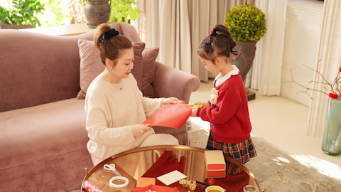 Family joyfully celebrating Chinese New Year together