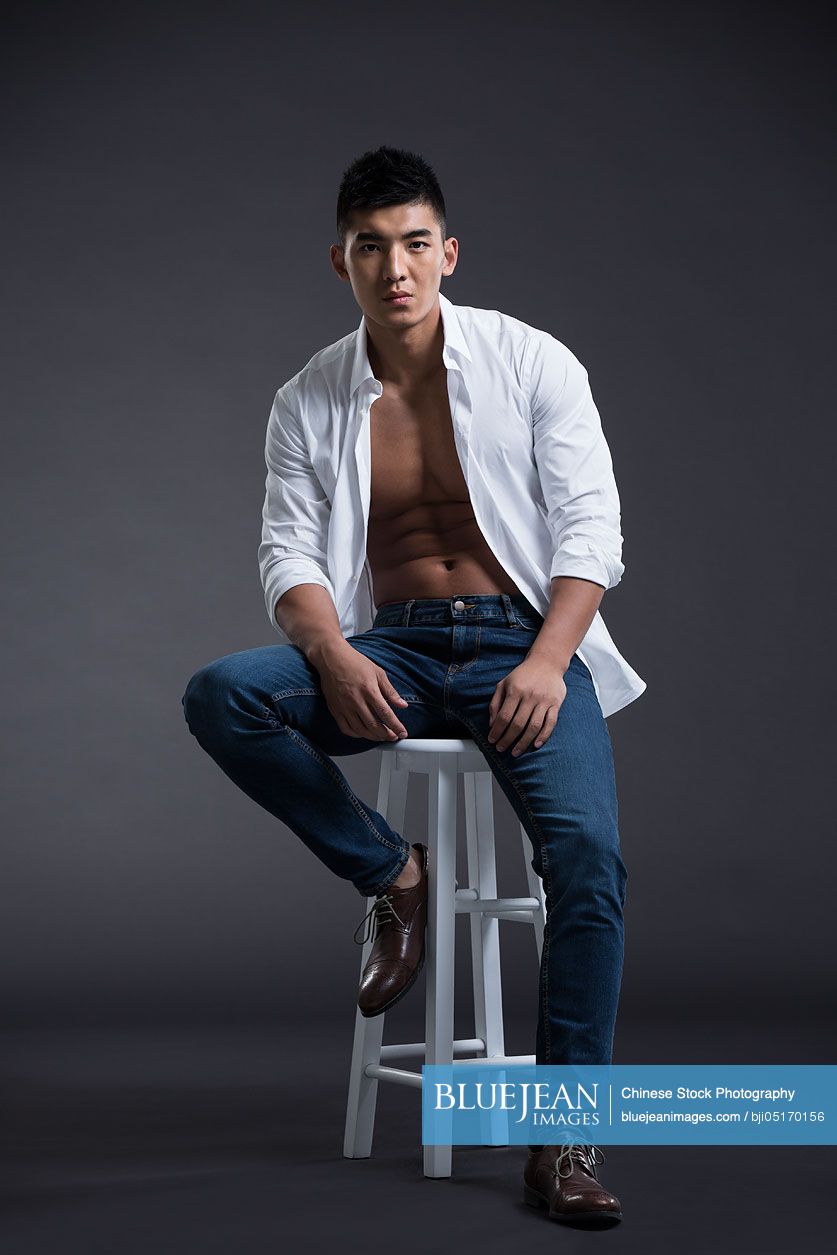 Portrait of young Chinese muscular man