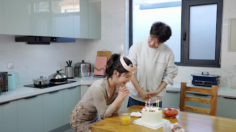 Young couple enjoying a special birthday celebration