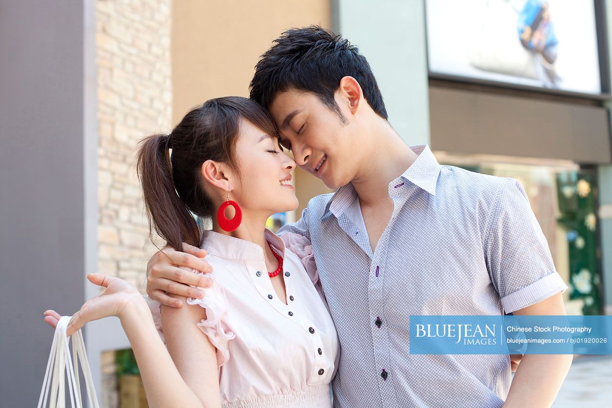 Chinese couple embracing