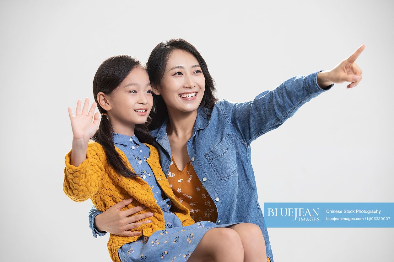 Happy Chinese mother and daughter