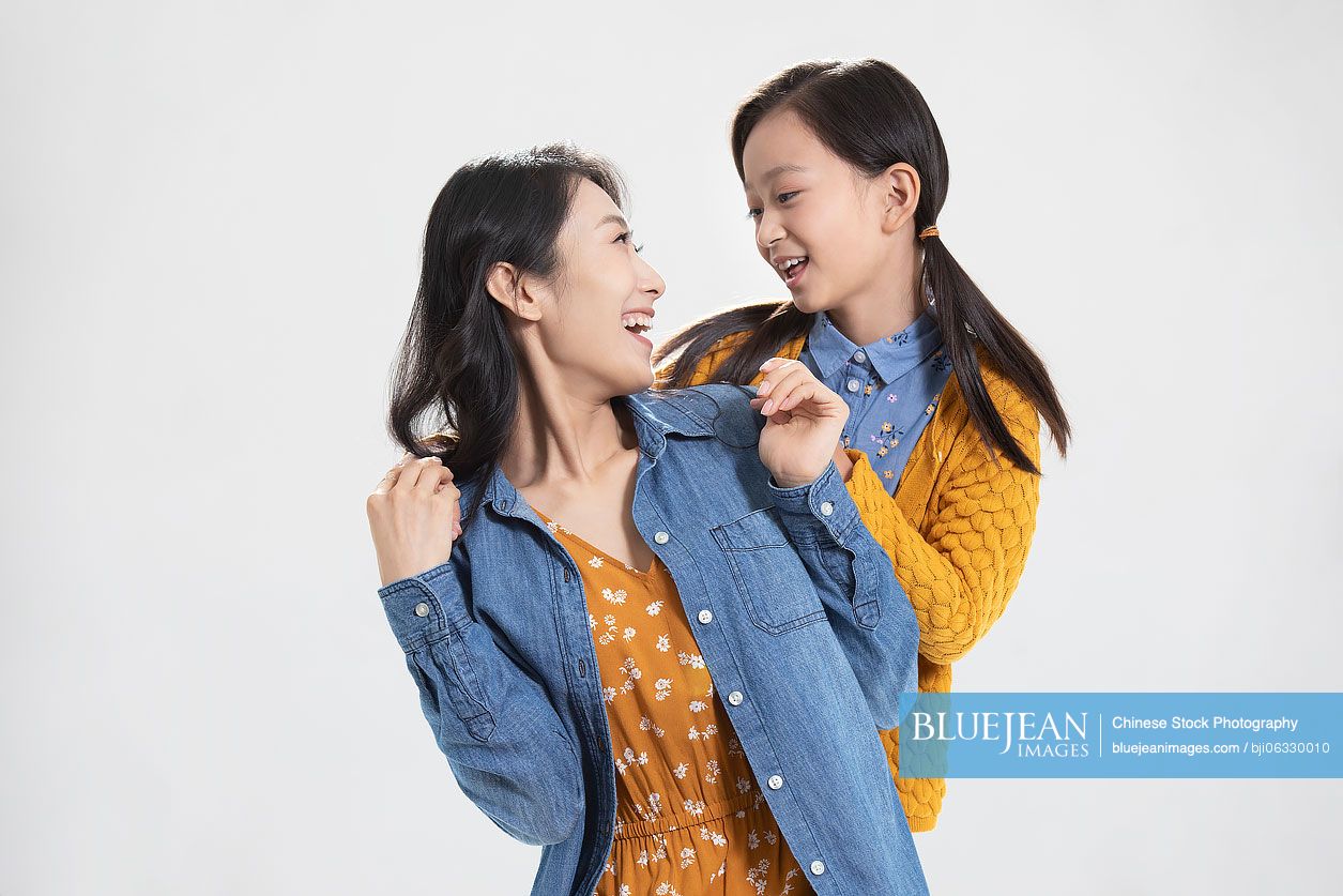 Happy Chinese mother and daughter